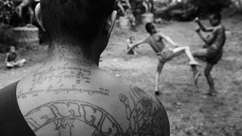 At the Golden Horse Monastery, Thai Buddhist abbot Khru Ba provides refuge for around 50 orphaned boys from Myanmar's Shan State. He accepts the boys as novice monks and trains them in kick-boxing and horsemanship [Jack Picone]