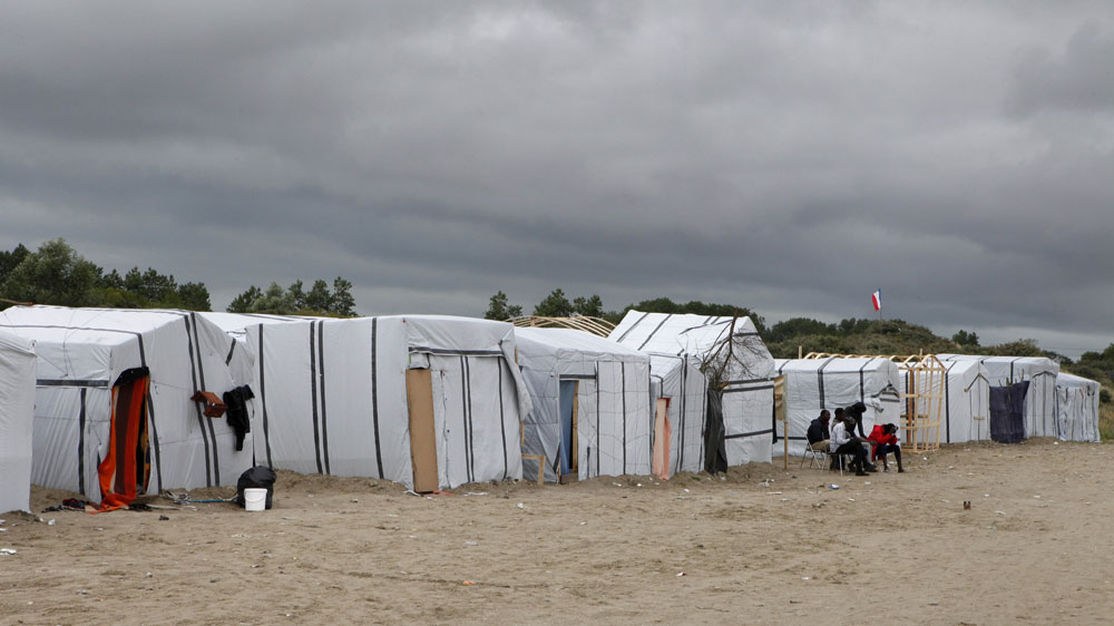 Thousands of refugees are desperate to make their way from Calais to the United Kingdom [AP]