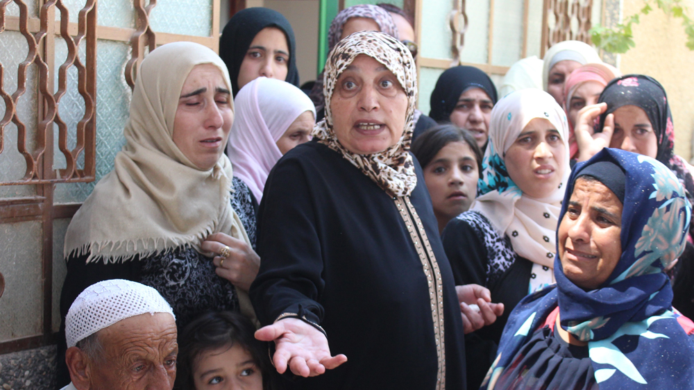 Members of the Dawabsheh family were grief-stricken as they awaited the arrival of his body at their home in Duma [Nigel Wilson/Al Jazeera]