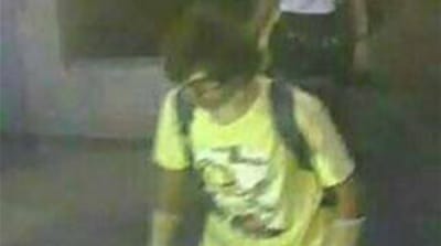 The photos of the suspect released [Reuters]