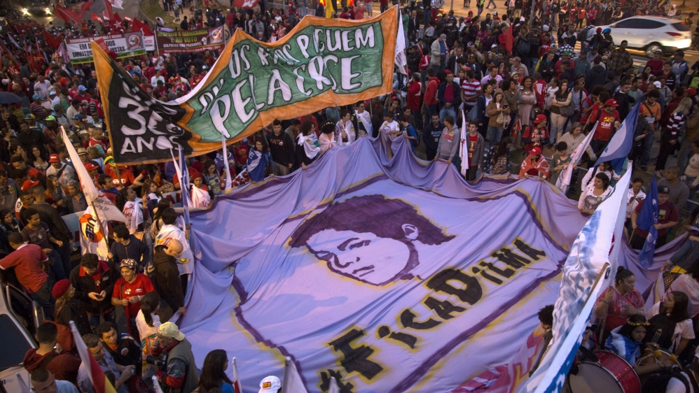 Rousseff not only faces opposition from the right but disillusionment among the left over economic austerity measures [EPA]