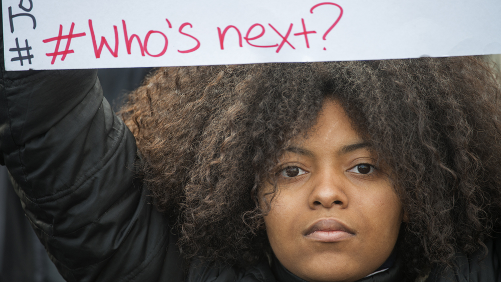 Thousands march to call for an end to police brutality and justice for those who have lost loved ones at the hands of police and law enforcement during the National March on Washington led by Al Sharpton and the National Action Network in Washington, DC on December 13, 2014 [Marvin Joseph/The Washington Post via Getty Images]
