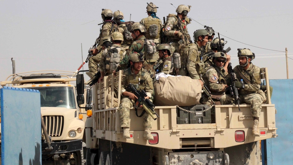Afghan special forces arrive for a battle with the Taliban in Kunduz city, northern Afghanistan