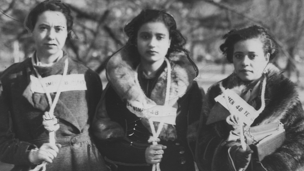 Three women stand with nooses around their necks as a form of protest against lynchings in 1946 [Afro American Newspapers/Gado/Getty Images] [Daylife]
