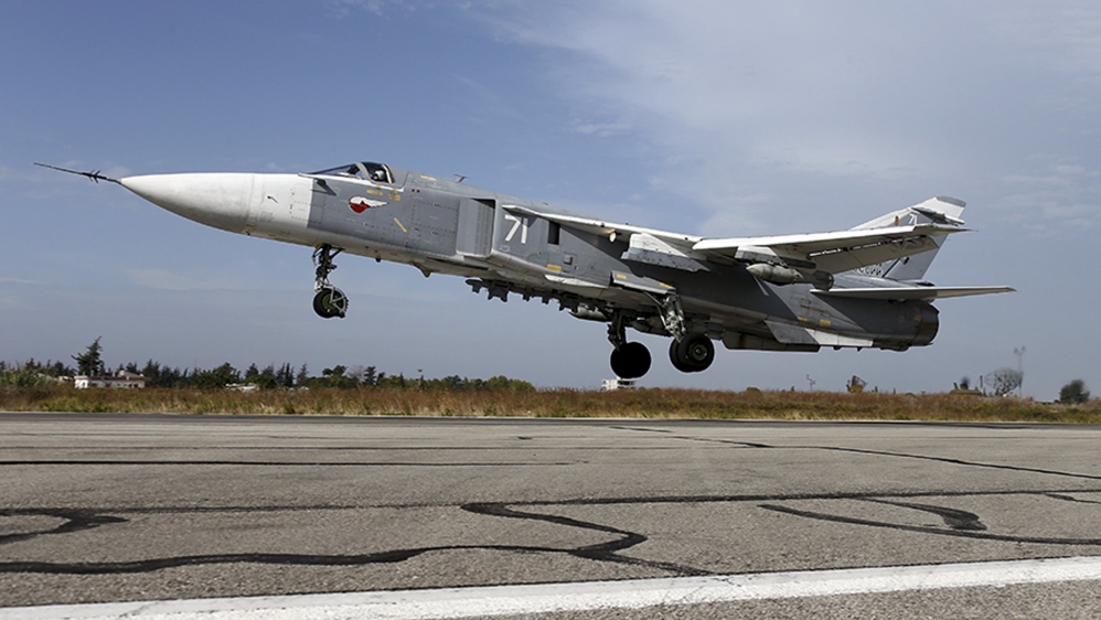 Russia''s Defence Ministry handout photo shows a Sukhoi Su-24 fighter jet taking off from the Hmeymim air base near Latakia, Syria