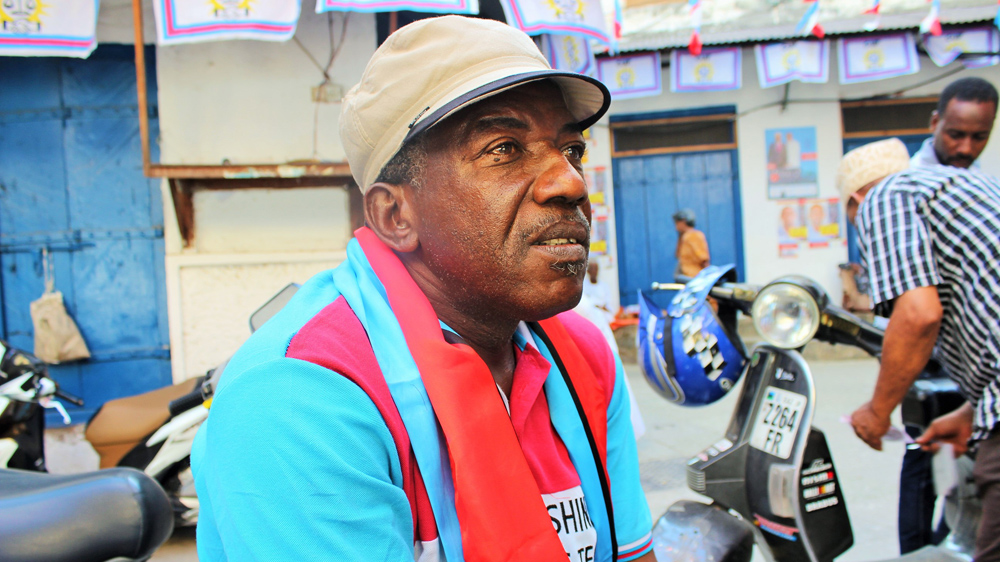 Ubwa Ahmad Maalim, 55, was beaten and then arrested during the last election [Tendai Marima/Al Jazeera]