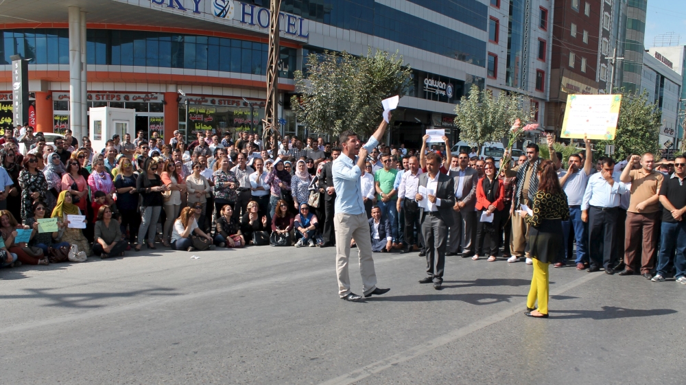 Kurdish residents take part in a protest in Sulaimania, northern Iraq [REUTERS]
