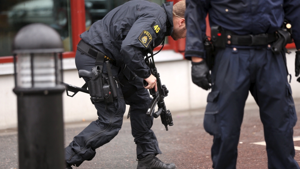 Police officers are seen at a school in Trollhattan [Reuters]