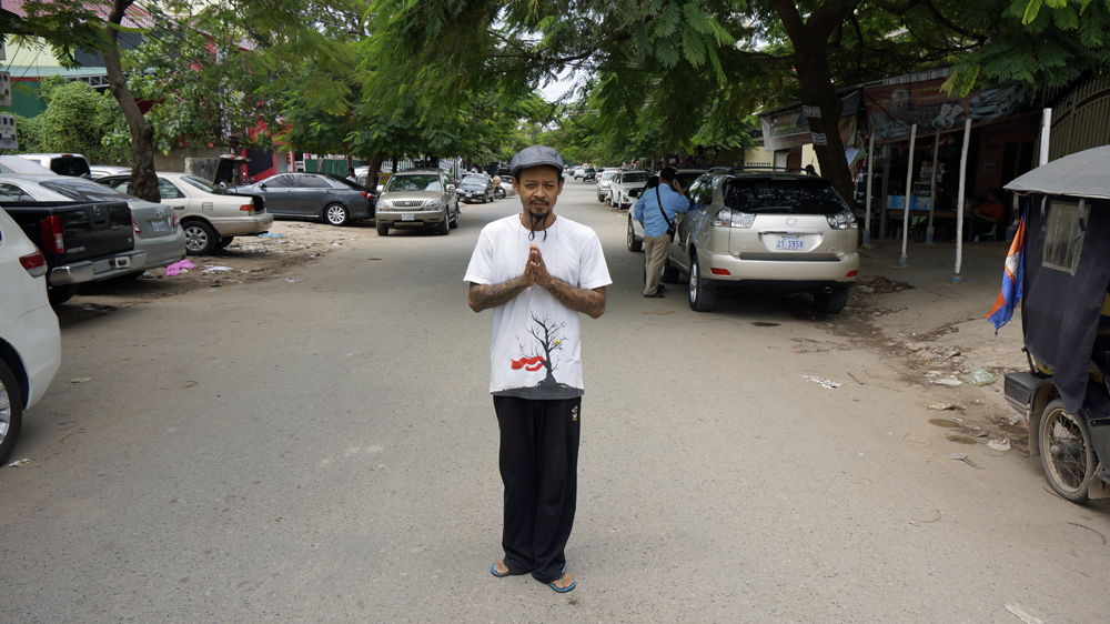 Kosal Khiev, a 'returnee' from the United States who is now a successful poet [Nathan A Thompson/Al Jazeera]