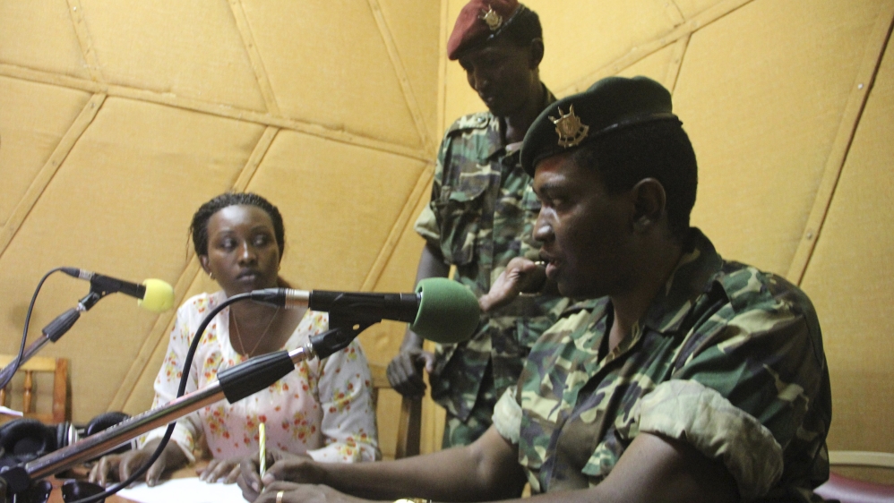 File photo of Major General Niyombare flanked by former Defense Minister Ndayirukiye addressing the nation inside the RPA broadcasting studios in Burundi''s capital Bujumbura