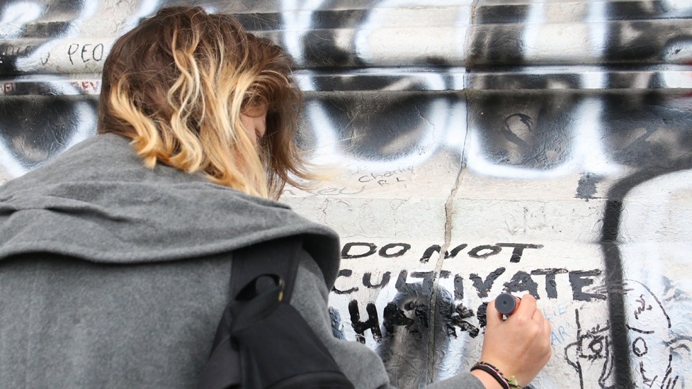 While public gatherings are banned, Parisians have found ways of expressing solidarity and mourning through social media outlets [Yann Schrieber/Al Jazeera]