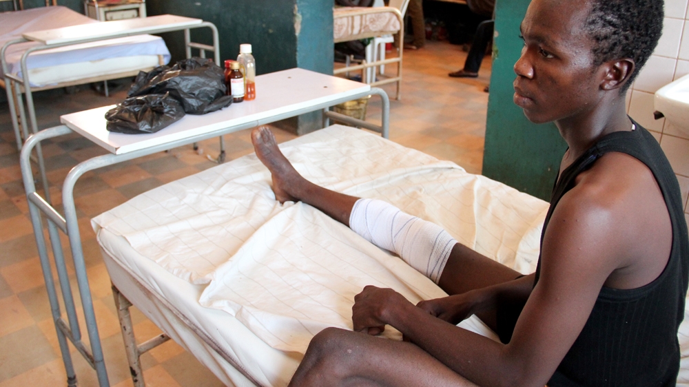 Muhtari Adamu was charging his phone battery at the phone repair shop at the centre of the blast and is now recovering in Yola's State Specialist Hospital [Femke van Zeijl/Al Jazeera]