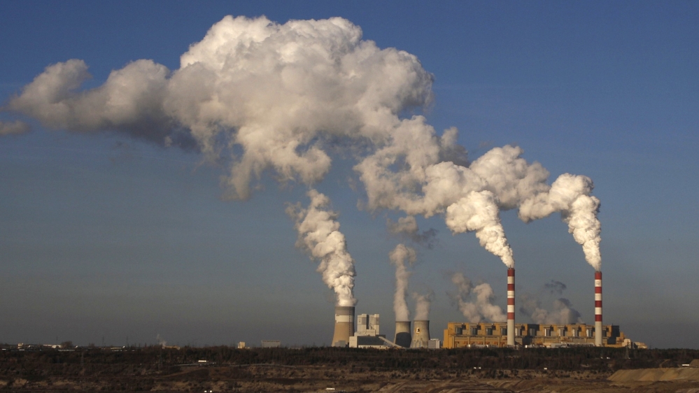 File photo of a motor glider flying near the Belchatow Coal Mine in Belchatow