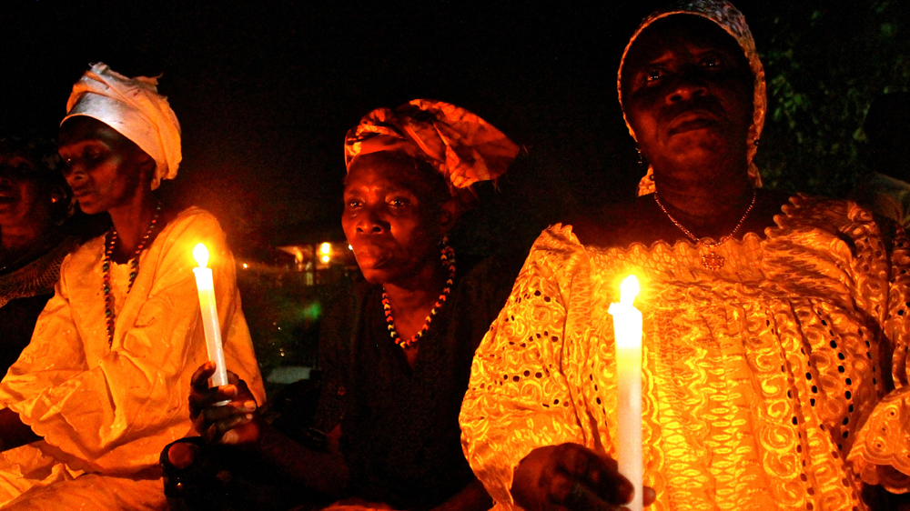 A candlelit vigil was held by healthcare workers to remember those who died in the outbreak [ Jo Lehmann/WaterAid ]