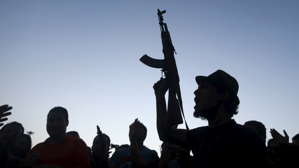 People take part in a protest against candidates for a national unity government proposed by U.N. envoy for Libya Bernardino Leon, in Benghazi