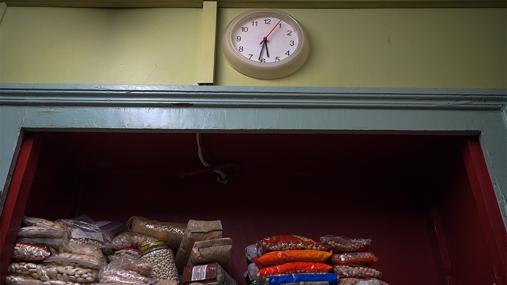 Although the EL CHEf anarchists could be evicted, Stathis, one of its founders, says they would simply continue their mission: to make sure refugees know they're welcome [Sorin Furcoi/Al Jazeera]