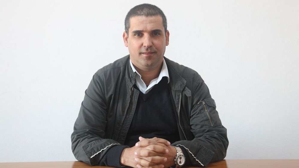 Ali wanted to be a lawyer, but due to his opposition activities, he was unable to get a job in his field [Thessa Lageman/Al Jazeera]