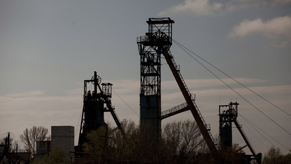 The elevator towers of an old mine in Krasnodon. The mines and the equipment they use date back to the Soviet Union. Soviet technology may not work very well, say people in the Donbass, but it will work forever. [Janos Chiala and Tali Mayer/Al Jazeera] 