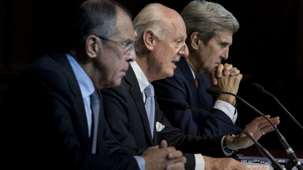 Russian Foreign Minister Lavrov and US Secretary of State Kerry listen while UN Special Envoy for Syria de Mistura speaks during a news conference at the Grand Hotel in Vienn