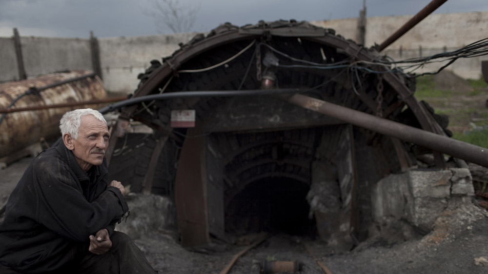 The entrance to an illegal mine near Shakthiorsk. The mine was closed after four young miners were killed in an explosion. [Janos Chiala and Tali Mayer/Al Jazeera] 