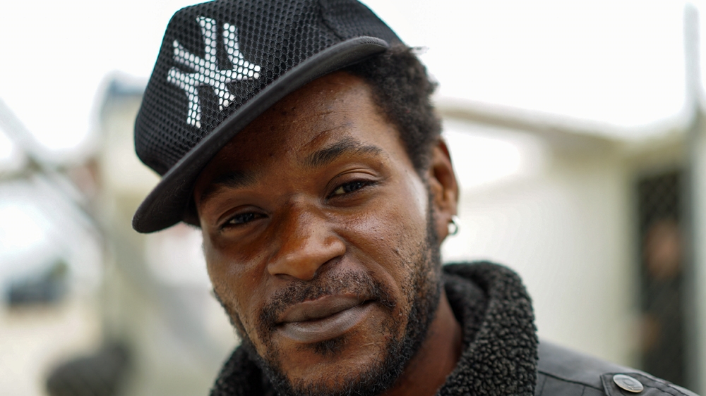 Geylo, 27, said he fled war-ravaged Congo with hopes of attaining asylum in France [Sorin Furcoi/Al Jazeera]