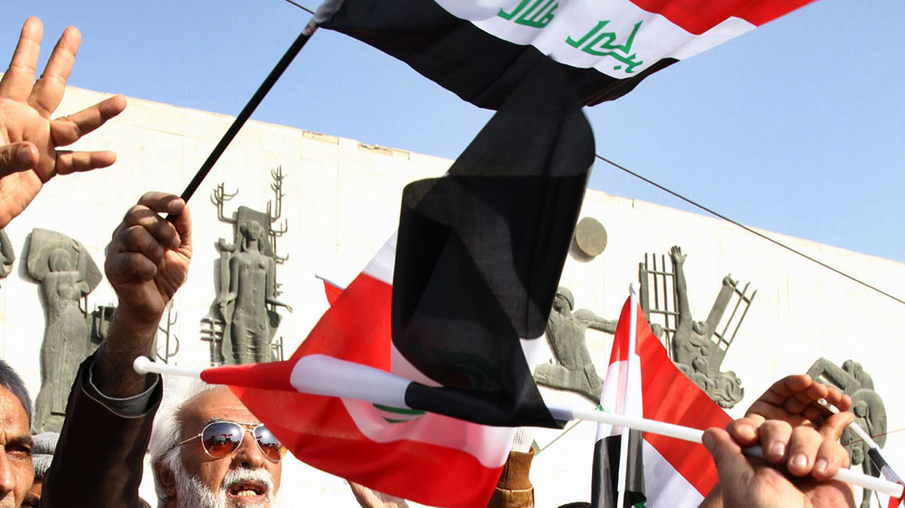 Shiite militia members protest Turkish military presence in north of country