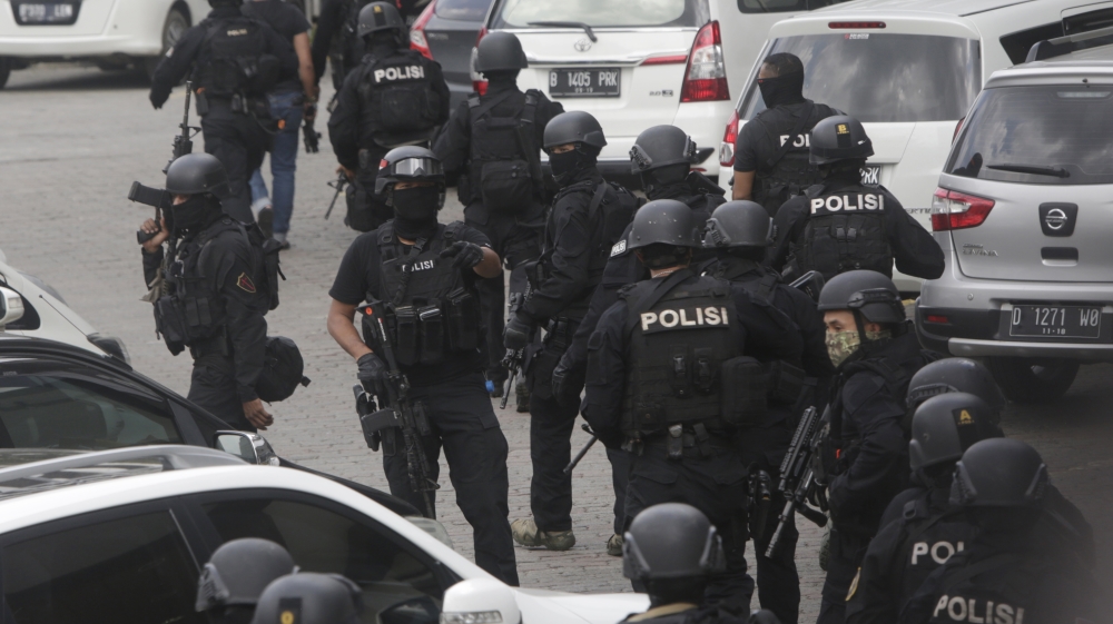 Police were deployed near the site where one explosion went off, as local media reported more blasts in other parts of the city [Dita Alangkara/AP]