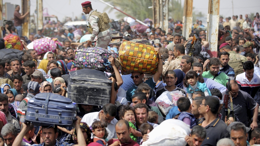 File photo of displaced Sunni people, who fled the violence in the city of Ramadi, arriving on the outskirts of Baghdad