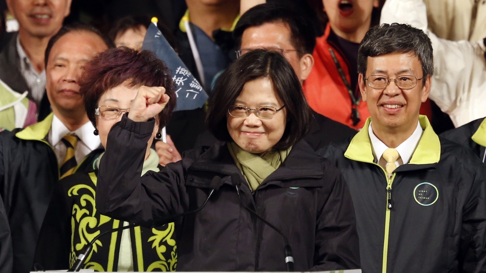 Taiwan''s Democratic Progressive Party, DPP, presidential candidate Tsai Ing-wen raises her hand as she declares victory in the presidential election, in Taipei, Taiwan [AP]