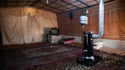 There is no heating, running water or toilets inside the informal tent settlements [Stylianos Papardelas/Al Jazeera]