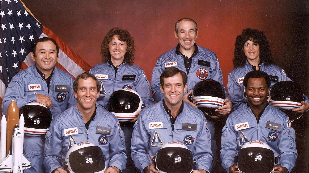 The doomed Challenger space shuttle (from left, front row) astronauts Mike Smith, Dick Scobee, Ron McNair and (from left, rear row) Ellison Onizuka, school teacher Christa McAuliffe, Greg Jarvis, and Judith Resnik [NASA]