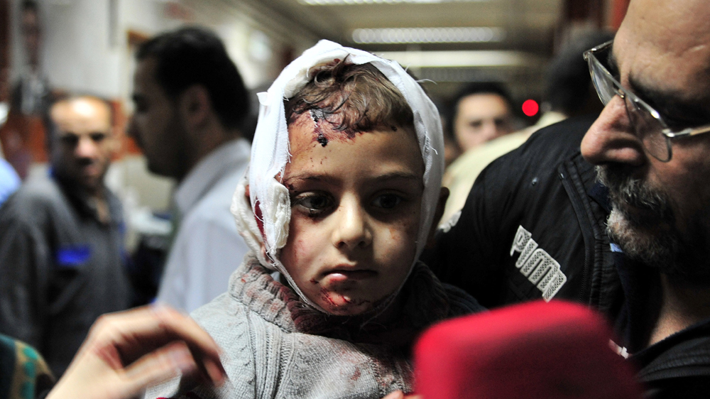 Over 120 killed in series of bombings in Syria government-held areas