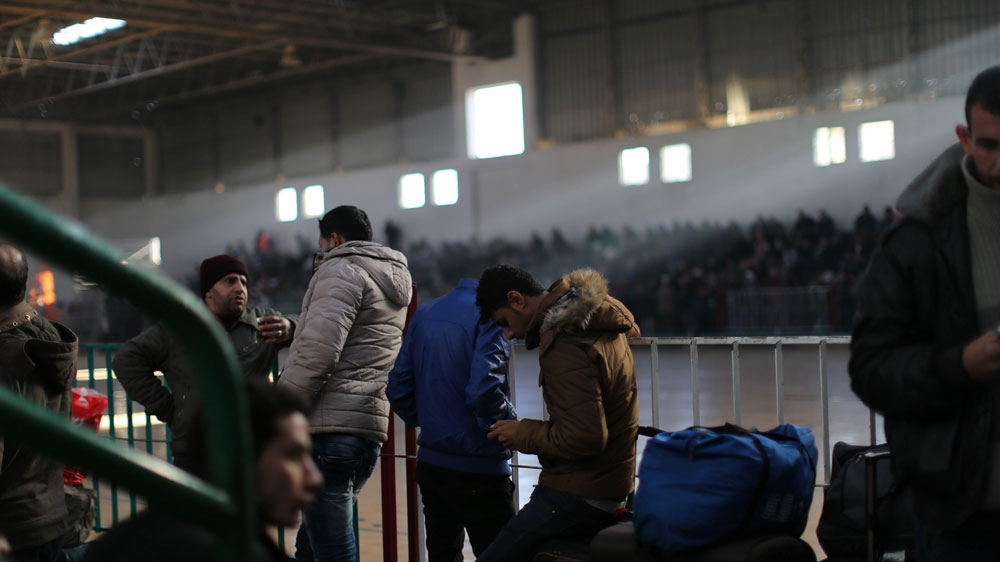 Hundreds waited inside the Abu Yousef an-Najjar Sports Centre for their turn to move on to the Rafah crossing [Ezz Zanoun/Al Jazeera]
