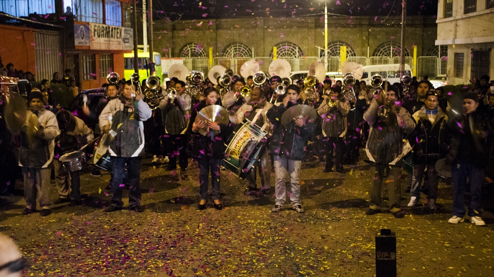 During the welcoming of the bands, the ensembles are received with parties and fireworks [Carlos Tello/Al Jazeera] 