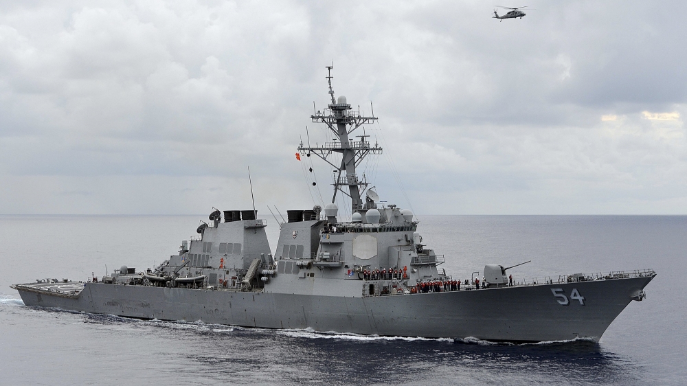 Handout file photo of the U.S. Navy guided-missile destroyer USS Curtis Wilbur patrolling in the Philippine Sea