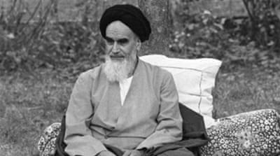 Photo dated October 1978 of Ayatollah Khomeini in his garden in Neauphle-Le Chateau a few months before his return to Iran [AFP]