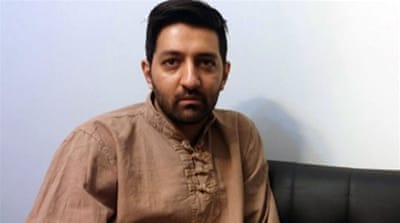 Iranian voter Sajjad [Hamid Reza Gholamzadeh/Al Jazeera]