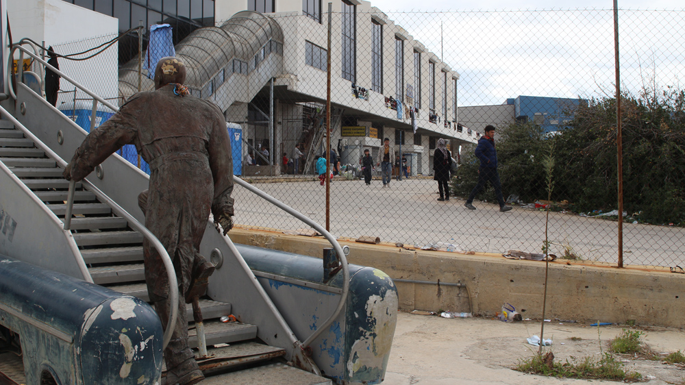 Thousands of Afghans are sleeping at the old Athens airport where they are being given temporary shelter [John Psaropoulos/Al Jazeera]