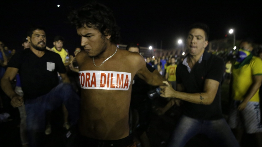 Protestors demand the resignation of President Rousseff