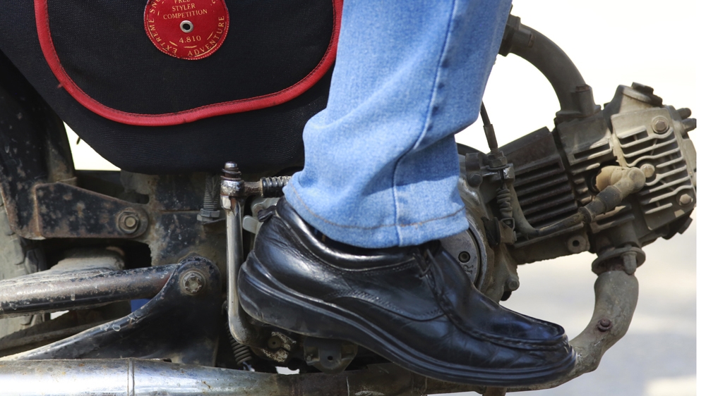 In a megacity of more than 20 million people, riddled with insecurity, their motorbikes can keep them out of danger or put them right in the line of fire [Max Becherer/Al Jazeera] 