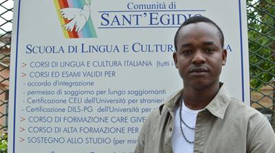 Alou Sango was lost at sea with fellow passengers on a dinghy for days before being rescued [Rosie Scammell/Al Jazeera]