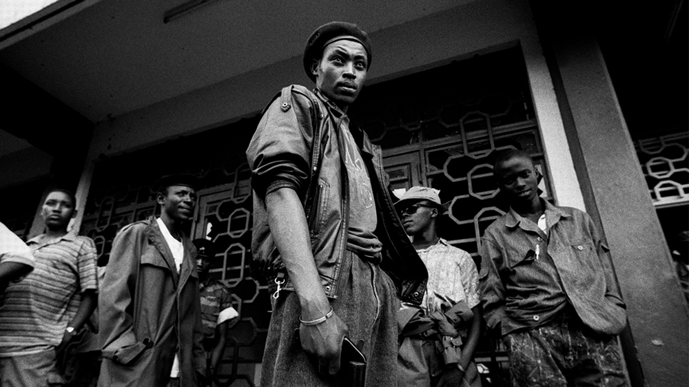 An armed civilian group south of Kigali [Jack Picone/Al Jazeera]