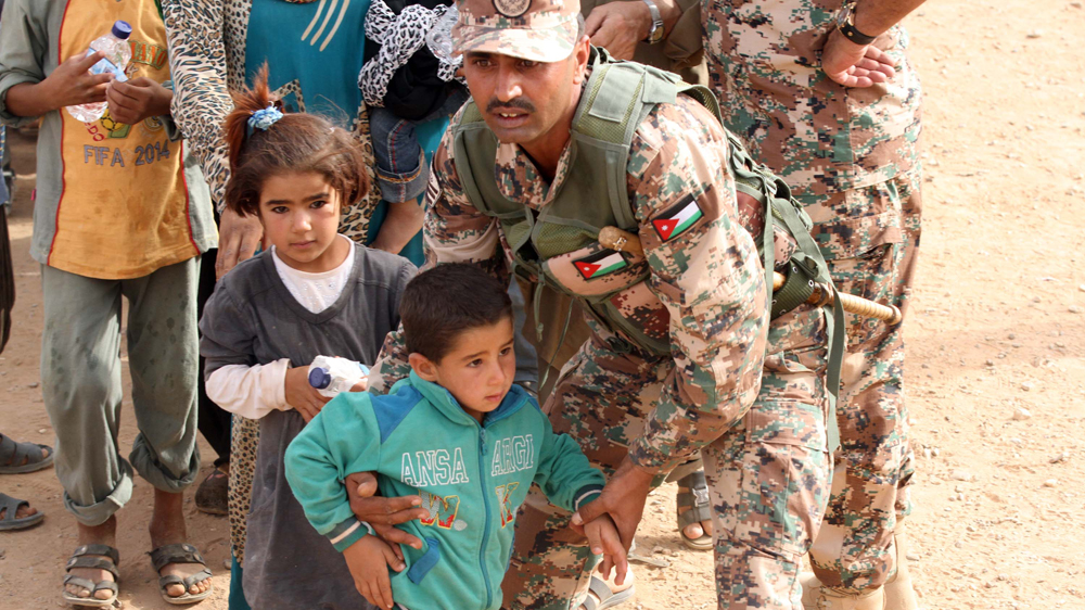 About 70,000 Syrian refugees are housed in the camp near Rukban [Jamal Nasrallah/EPA]