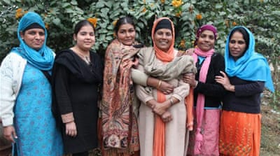  Bibi with the team of workers who help run the home [Photo courtesy of Unique Home for Girls] 
