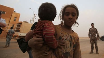Syrian refugees arrive at the area of Al-Roqban in Jordan [Getty]