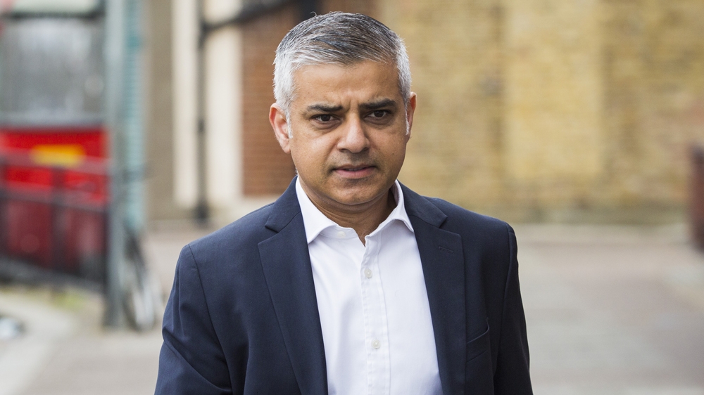 The UK’s distancing guidelines do not mention face masks, but Khan said that should change