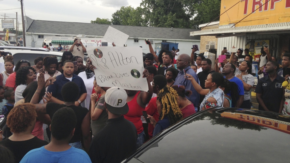 People protest after Alton Sterling was shot and killed during an altercation with two Baton Rouge police officers in Baton Rouge Louisiana