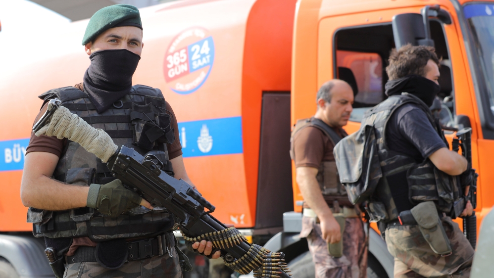 Members of police special forces are seen in front of the Air Force Academy in Istanbul