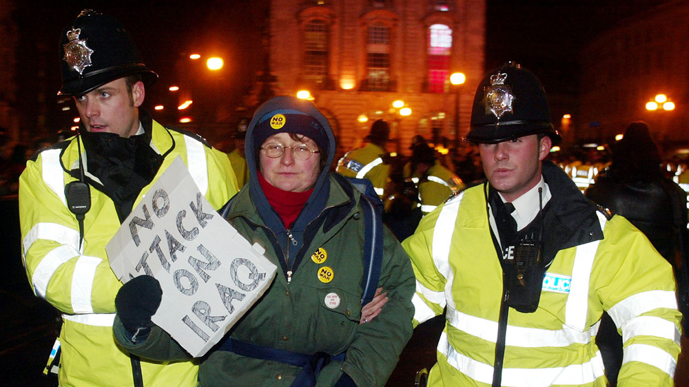 An anti-war protester is arrested during the February 15, 2003 demonstration [Stephen Hird/Reuters]