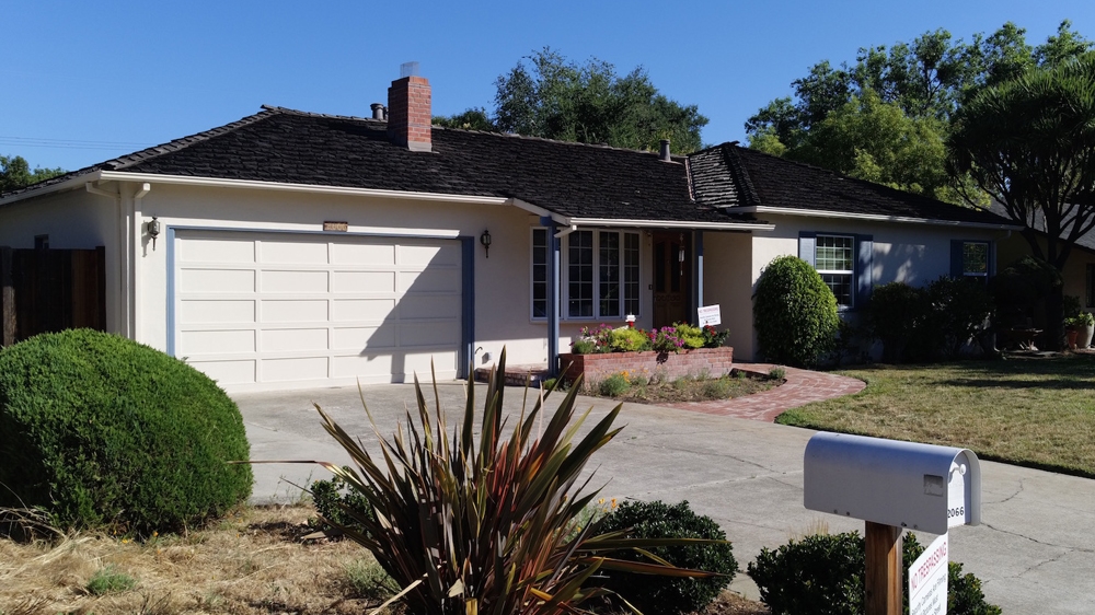 The gerage in Los Altos where Steve Jobs founded Apple 40 years ago [Kamahl Santamaria / Al Jazeera]